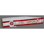 A sash worn by the Arsenal players prior to the start of the "Champions Challenge Match" at
