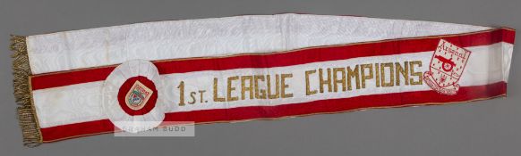 A sash worn by the Arsenal players prior to the start of the "Champions Challenge Match" at