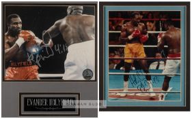 Two Evander Holyfield signed photographic presentations, both with colour 8 x 10 in. fight action