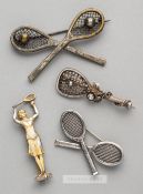 Four tennis brooches,  comprising three white metal brooches, two of crossed racquets with pin clasp
