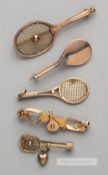 Four 9ct gold tennis racquet brooches,  two featuring tennis ball on strings, one without and