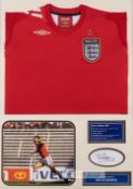 Bryan Robson signed England display, comprising red England retro jersey embroidered with national