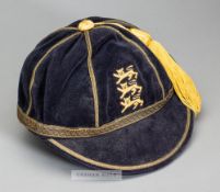 England Schools' F.A. representative cap, navy velvet with yellow tassel and gilt braiding,