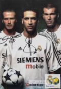 A Real Madrid "Galactico" David Beckham, Raul and Zinedine Zidane signed colour photographic print,