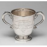 Large silver trophy cup Middlesex Boys’ Doubles trophy cup with Fred Perry listed as a winner,
