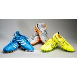 Three pairs of Stoke City's Peter Odemwingie signed football boots, comprising a pair of blue Adidas