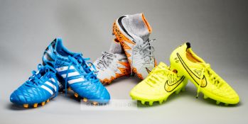 Three pairs of Stoke City's Peter Odemwingie signed football boots, comprising a pair of blue Adidas