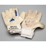 Brad Friedel signed Adidas goalkeeper's gloves,  white and cream gloves with BRAD FRIEDEL printed on