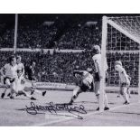 West Ham United's Trevor Brooking signed b & w photographic print of the winning goal v Arsenal in