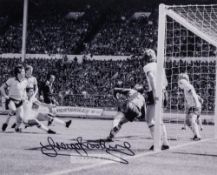 West Ham United's Trevor Brooking signed b & w photographic print of the winning goal v Arsenal in