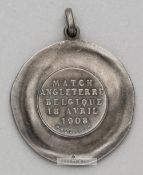 Memorabilia relating to Charles James Hughes and Harry Halmshaw Hughes, a silver medal awarded to