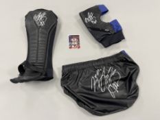 Irish wrestler Finn Balor signed WWE wrestling shorts, shin guard and knee pad, blue and black
