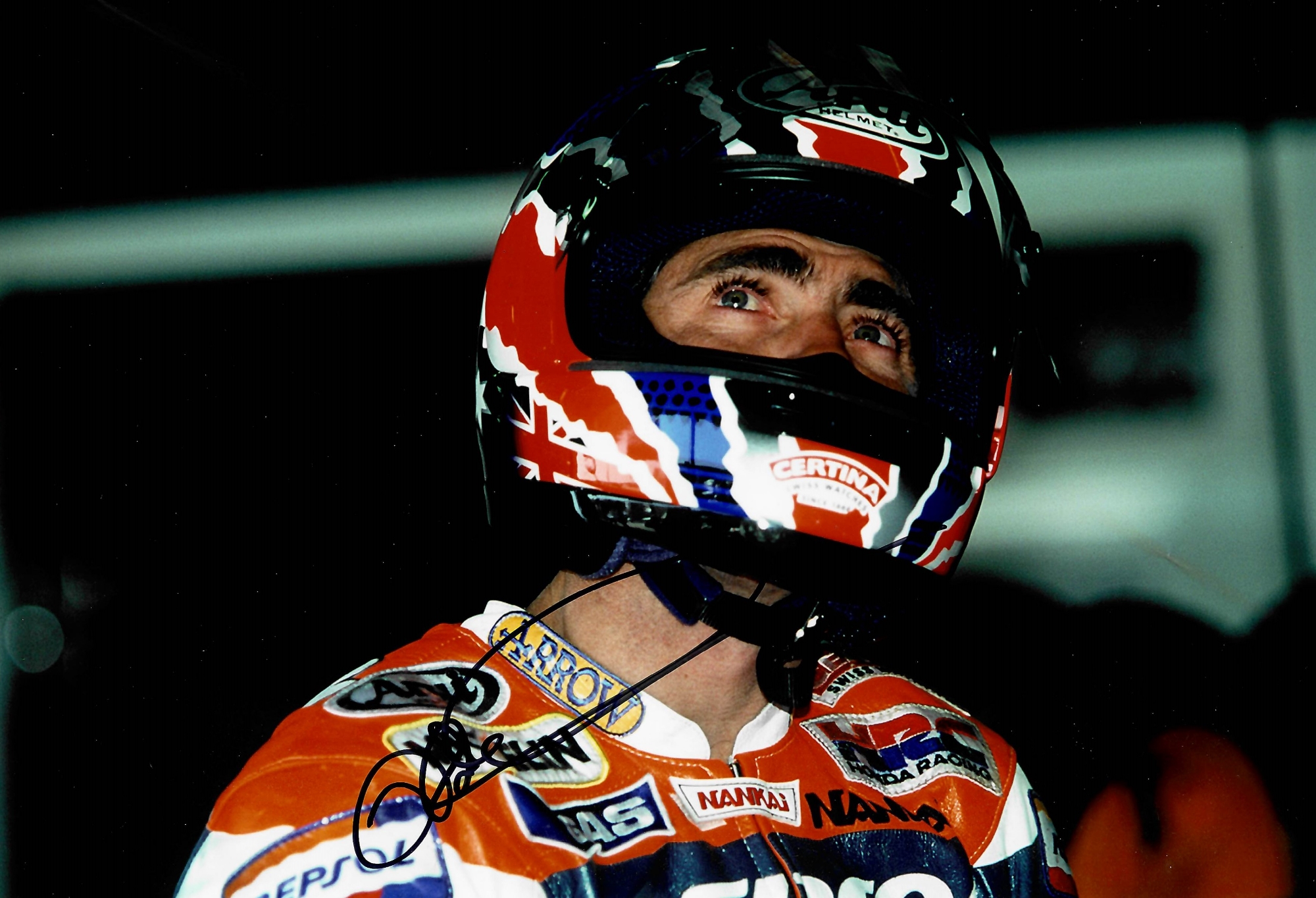 Collection of Moto GP Legends, seven signed 8 by 10in. photographs, including Mick Doohan, Wayne
