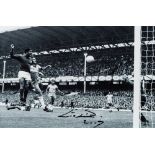 Eusebio signed photograph, 8 by 12in. b&w portraying Eusebio in action during the 1966 World Cup