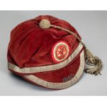 Two schools’ representative football caps, a Wales Schoolboy F.A. 1960, red velvet with gilt
