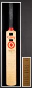 A signed cricket bat formerly owned by the broadcasting legend Brian 'Johnners' Johnston and on