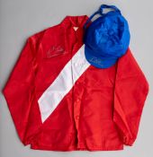 Cheveley Park Stud racing silks signed by Kieren Fallon, red jacket with white sash, royal blue cap,