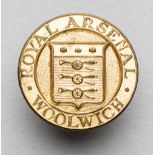 A badge of interest to Arsenal collectors being for the Royal Arsenal, Woolwich, in gilt-metal by