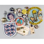 A collection of football badges, mostly metal & enamel, also cloth including and England three