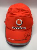 Lewis Hamilton (UK) signed Vodafone McLaren-Mercedes silver cap, signed in black permanent marker on