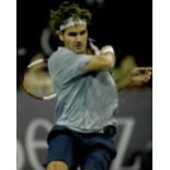 Roger Federer, The Greatest of All Time (GOAT) signed action 8 by 10in. tennis photograph, Signed in