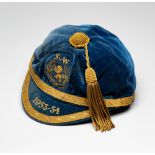 Scotland international cap awarded to Lawrie Reilly for the match v Wales played at Hampden Park 4th