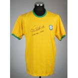 Two Brazilian legends signed jerseys, comprising Carlos Alberto signed yellow Brazil retro jersey,