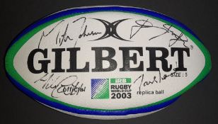 2003 RWC Size 5 Gilbert Official Winners Rugby Ball signed by four players, England's winning