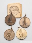 Four 1930 Uruguay World Cup commemorative medals by Stefano Johnson of Milan