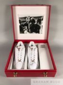 A unique pair of white Reebok trainers signed by 10 of the 1966 England World Cup squad in 2006 in