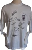 England retro home shirt signed by nine of England's greatest players with six being captains or