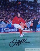 David Beckham signed magazine picture playing for England v Brazil at Wembley during a 1-1 draw,