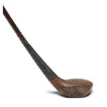 A group of four hickory-shafted golf clubs,