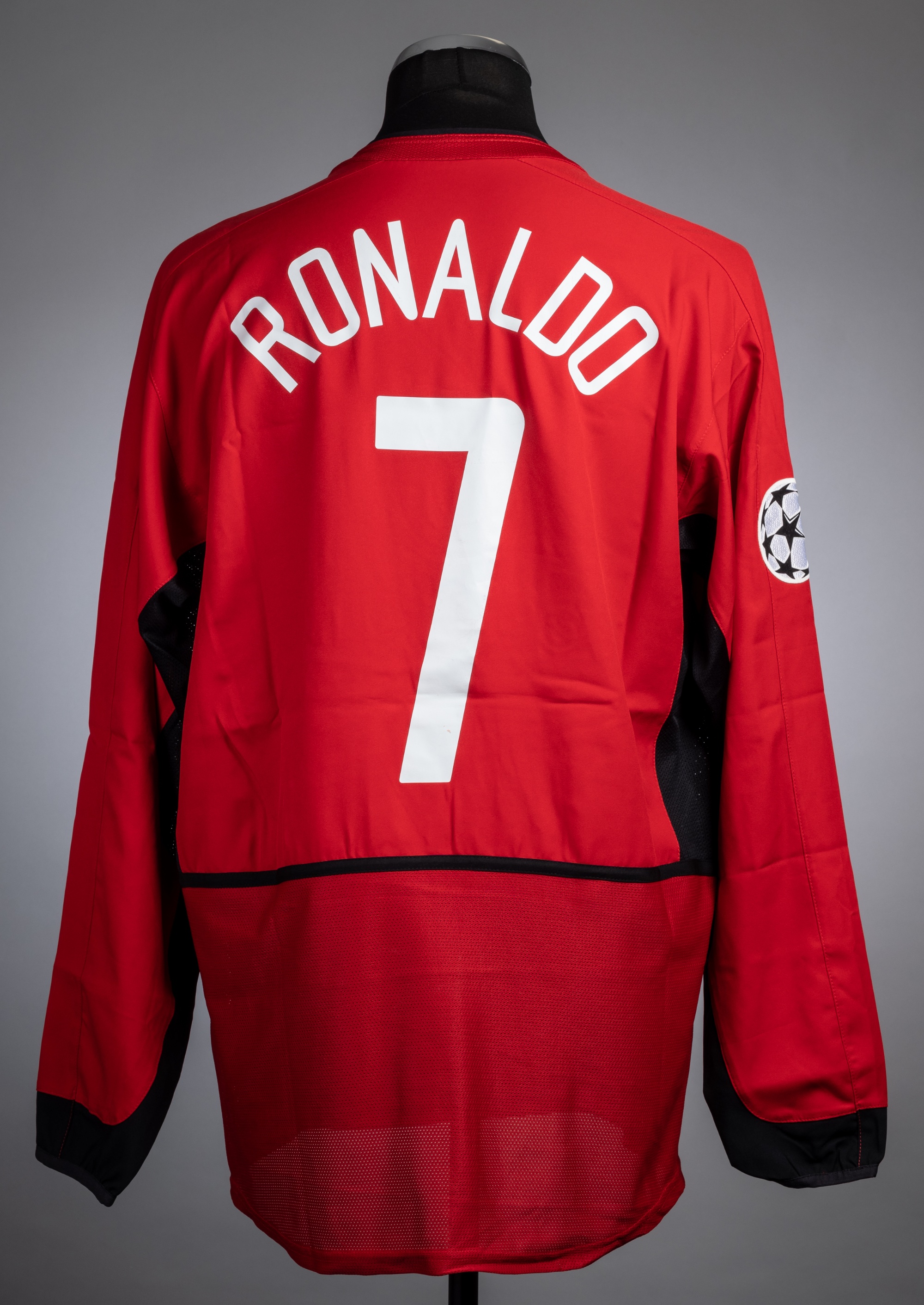 C. Ronaldo red & white Manchester United no.7 jersey prepared for the match v VfB Stuttgart, 2003
