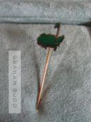 An Augusta Masters pin by Garrard