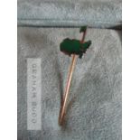 An Augusta Masters pin by Garrard