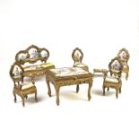 A group of seven European miniature enamel and ormolu salon items of furniture