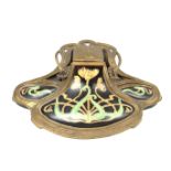 An Art Nouveau ceramic and brass inkwell, early 20th century