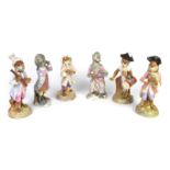 A group of six German porcelain monkey band figures