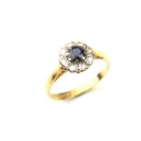 18 ct yellow gold sapphire and diamond flower cluster ring.