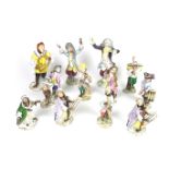 A group of twelve German Volkstedt porcelain monkey band figures
