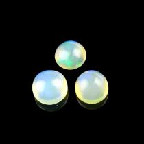 Three loose circular cut opals.