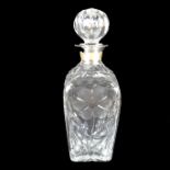 A Modern English silver collared glass decanter