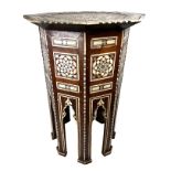 A Middle Eastern octagonal inlaid wood table, 19th century