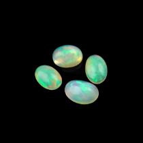 Four loose oval cut opals.