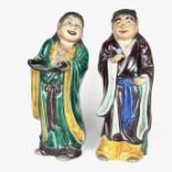 A pair of Chinese sancai glazed pottery figures, 20th century
