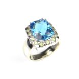 14 ct white gold blue topaz and yellow paste ring.