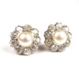 Gold diamond and pearl cluster earrings.