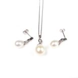 9 ct white gold pearl and diamond pendant necklace and earrings.