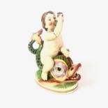 A rare Derby ceramic figural group of a young boy riding a dolphin, early/mid 19th century